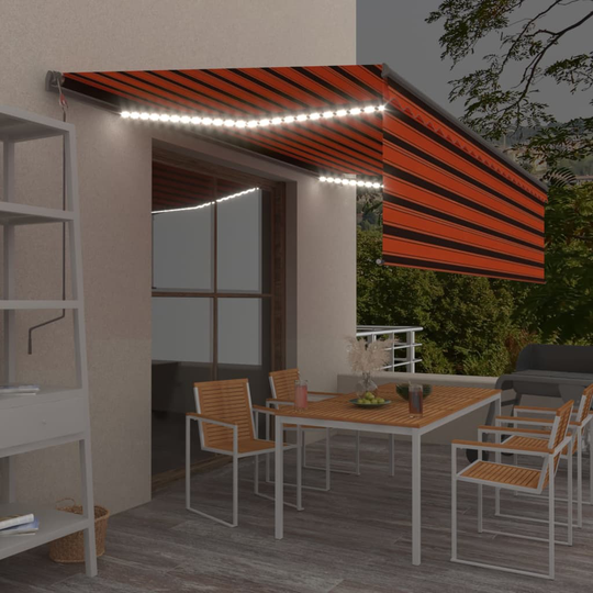 vidaXL Manuaalisesti kelattava markiisi verho/LED 5x3 m oranssiruskea