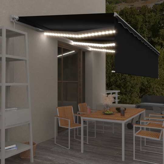vidaXL Käsin sisäänkelattava markiisi verhot/LED 6x3 m antrasiitti