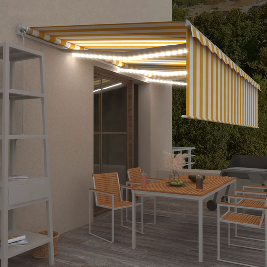 vidaXL Käsin sisäänkelattava markiisi verhot/LED 6x3 m keltavalkoinen